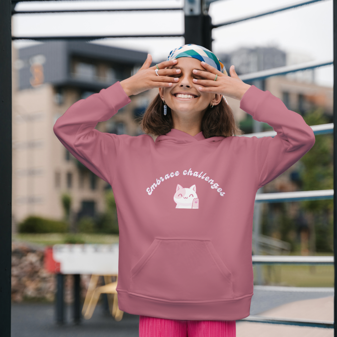 girl standing, having fun, wearing comfy positive affirmation pink hoodie